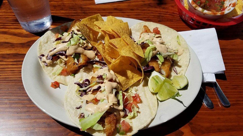 Beer Battered Fish Tacos · Beer battered cod, cabbage, our white sauce and pico. On soft white corn tortillas.