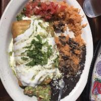 Chimichanga · Flour tortilla, filled with Meat Choice*, refried black beans, rice, onions, cheese, then de...
