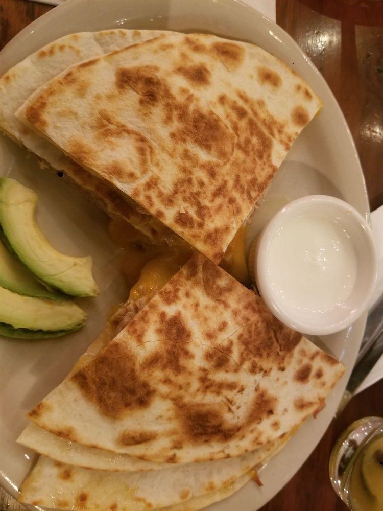 Quesadilla · Ten-inch flour tortillas with jack and cheddar cheese in the middle. Sour cream and avocado on the side.
