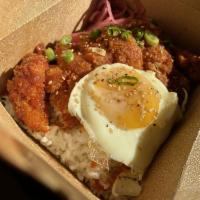 Cowboy Katsu · Japanese-style fried chicken cutlet. Served on a bed of fluffy white rice, drizzles in smoky...