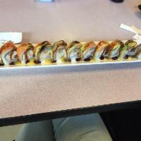 Las Vegas Roll · Raw. Deep fried shrimp, cream cheese, smoked salmon, & crabmeat topped with salmon, eel, and...