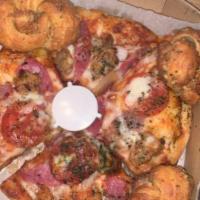 Meat Lovers Pizza · Pepperoni, sausage, meatballs, salami and bacon.