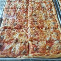 Sausage Pizza By the Slice · Homemade thick crust pizza with sausage and shredded mozzarella cheese.
