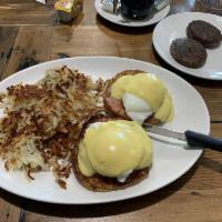 Eggs Benedict Breakfast · 2 poached eggs with Canadian bacon on toasted English muffin halves topped with hollandaise ...