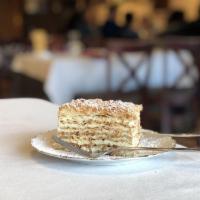Napoleon Cake · Delicate layers of pastry and vanilla cream.