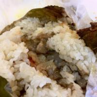Sticky Rice in Lotus Leaf · Sticky rice filled with pork and shrimp steamed in Lotus leaf for that tea like flavor. 2 pe...