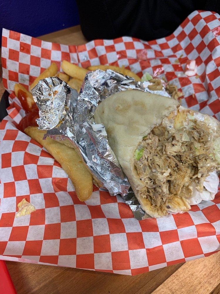 Gyro Pita Sandwich · Lettuce, tomato, onion and white sauce.