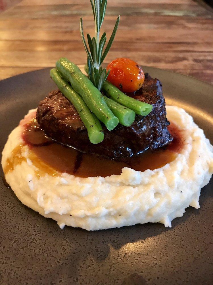 Filet Mignon · Center cut of beef filet mignon served with French beans over cheesy mashed potatoes with mushroom demi-glace sauce.