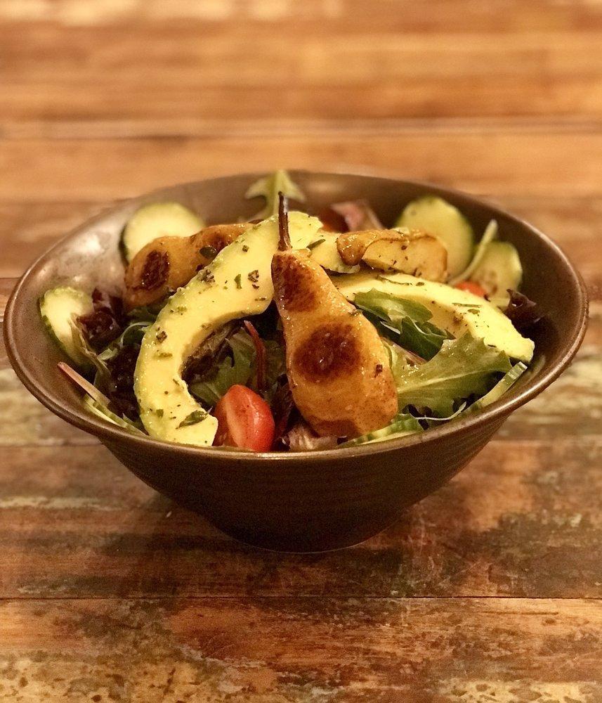 Avocado Salad with Caramelized Pear · Fresh mixed greens, avocados, cucumbers, cherry tomatoes, caramelized pear with extra virgin olive oil, lemon juice and vinegar.
