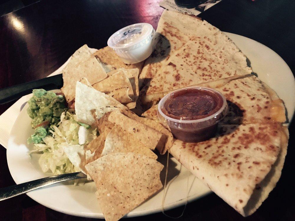 Quesadilla · Chicken, ground beef, pulled pork or veggie. Served with tortilla chips, lettuce, tomatoes, guacamole, salsa and sour cream on the side.