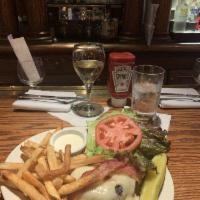 Cheeseburger · Clyde’s hamburgers are 6 ¾ ounces of locally ground chuck sourced from Cedar River Farms®. G...