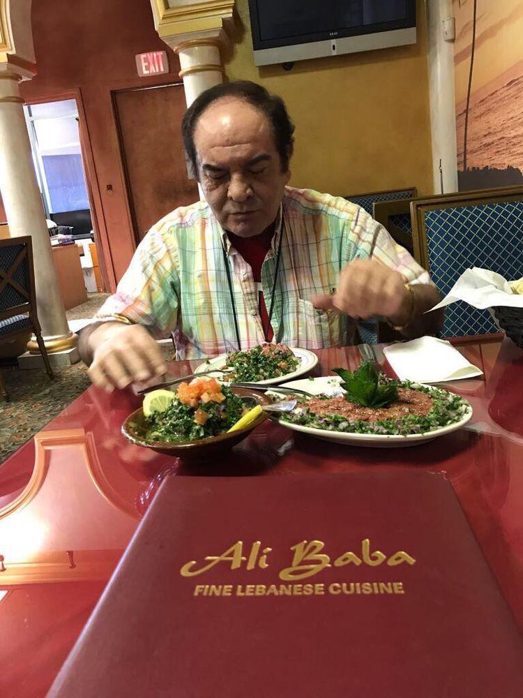 Ali Baba's Salad · Mixed greens, chopped tomatoes, fresh cucumbers, onions, bell peppers, parsley, feta cheese and black olives in a lemon dressing. 