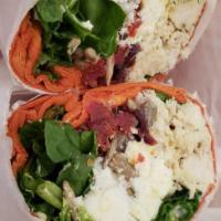 Warrior Wrap · Cold wrap with chicken, spinach, sun dried tomatoes, feta cheese, sunflower seeds, cranberri...