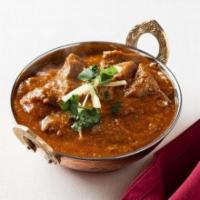 Lamb Curry · Boneless lamb, onions, and tomatoes based sauce and Indian spices.