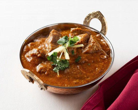 Lamb Curry · Boneless lamb, onions, and tomatoes based sauce and Indian spices.