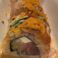 Shobu Roll · Slices of tuna, cream cheese, cucumber, 3 pieces of torched salmon, avocado, topped with Sri...