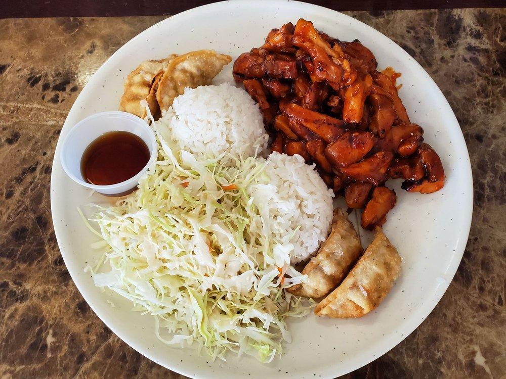 Spicy Chicken Teriyaki · Grilled chicken with traditional Japanese thick spicy sauce and teriyaki. Served with choice of side and salad. Spicy.