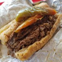 Italian Beef · Our famous slow roasted seasoned all-natural beef thinly sliced in house on a 7