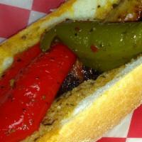 Italian Sausage · Char-grilled on fresh turano roll with a splash of natural gravy