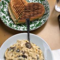 Fettuccine Alfredo · Made in a rich Parmesan cream sauce with grilled chicken breast and sauteed mushrooms.