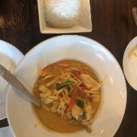Red Curry · Bamboo shoot, bell peppers and fresh basil leaves.