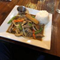 Pepper Steak · Slices of tender beef sauteed with onions, mushroom, carrot, bell peppers and black peppers....