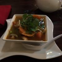 Tom Yum Soup · Hot and sour, onions, mushroom and tomato.