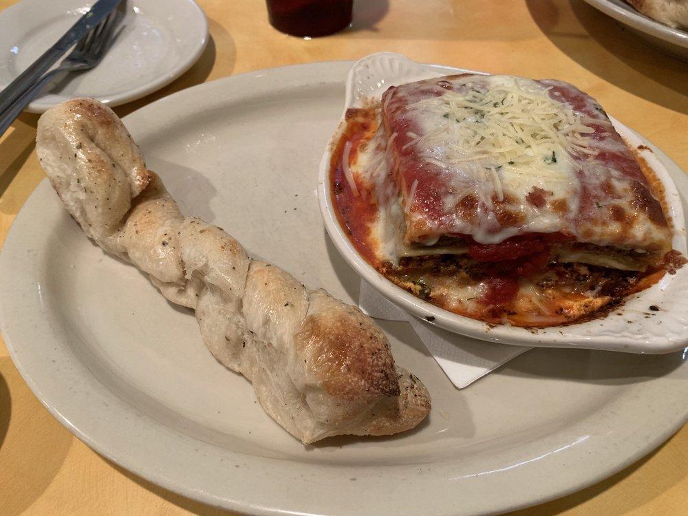Lasagna · It's homemade and it's excellent. Cheesy and hearty made with fresh ground beef, sausage and smothered in our homemade marinara and mozzarella.