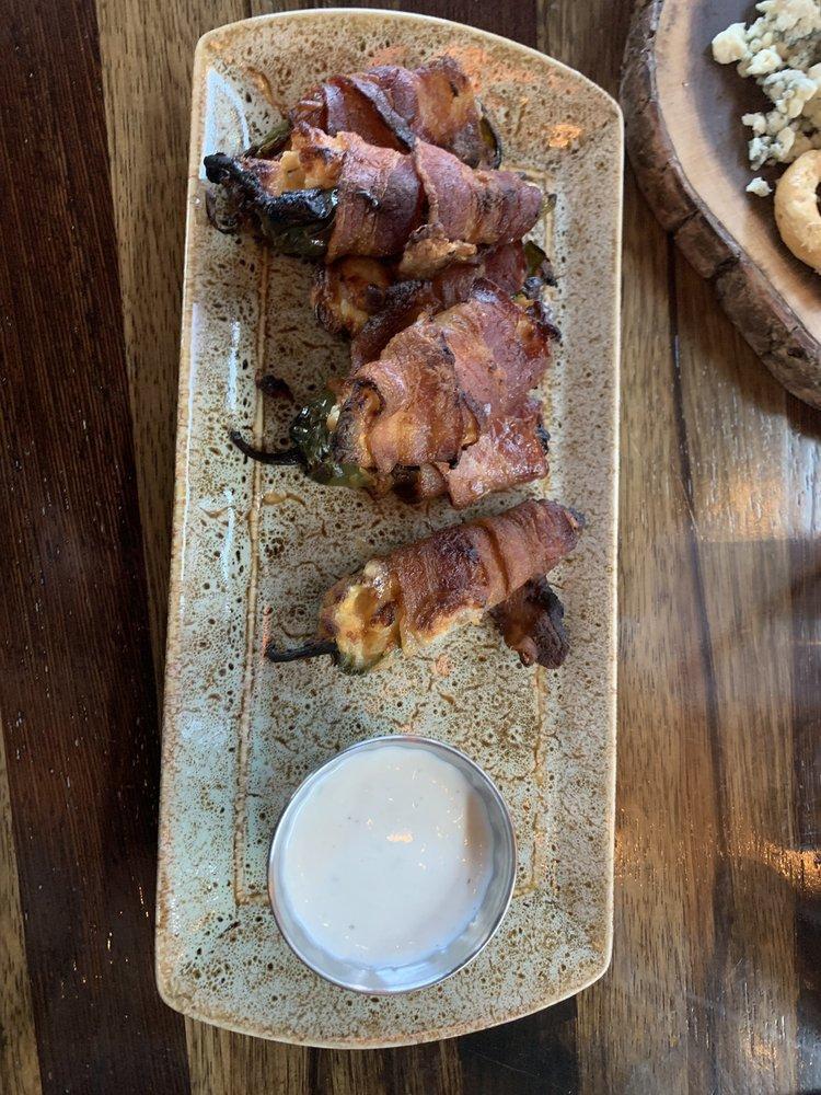Bacon Wrapped Jalapenos · Stuffed with our savory cheese blend, wrapped in applewood smoked bacon.