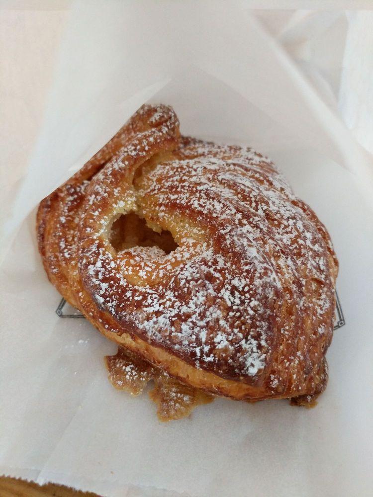 Meyer Lemon Croissant · Our flaky croissant filled with house made Meyer lemon cream, dusted with powdered sugar. 