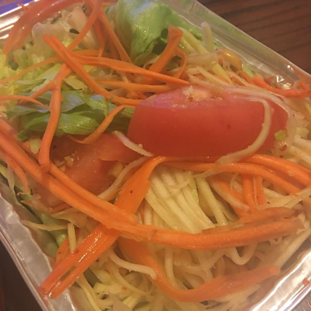 Green Papaya Salad · Shredded green papaya with tomatoes, string beans, ground peanuts and spicy lime juice. 