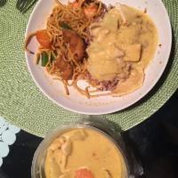 Yellow Curry · Choice of meat cooked in mild yellow curry paste with coconut milk, potatoes, carrots and on...