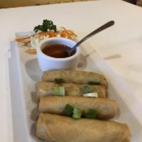 Spring Rolls · Deep-fried rolls with a filling of cabbage, carrots. celery and glass noodles served with sw...
