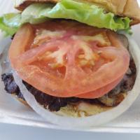 Psychedelic Burger · Potato bun - marinated mushrooms, Swiss cheese, lettuce, tomato, onion and mayo.