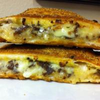 Philly Cheesesteak Stromboli · Seasoned steak, mozzarella and white American cheeses. Folded in a hand-tossed original crus...