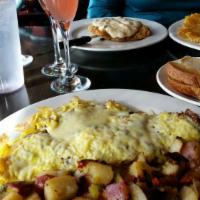 Chicken Fried Steak · Lightly battered hammered steak, covered in house sausage country gravy, with 3 eggs any sty...