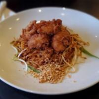 Pad Thai · Rice noodles, egg, peanut, bean sprouts and scallions with crispy shrimp.