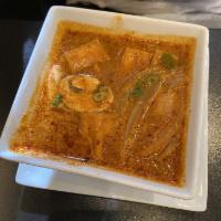 Tom Kha Soup · Coconut broth with galangal (similar to Thai ginger), yellow onions, kaffir lime leaves, lem...