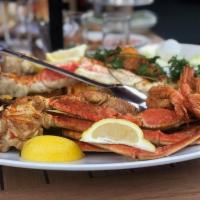 The Crab and Lobster Feast For 2 People · A whole Maine lobster with king crab legs, snow crab legs, jumbo shrimp and catch of the day...