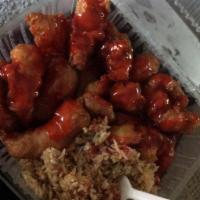 Sweet and Sour Chicken · Served with steamed rice.