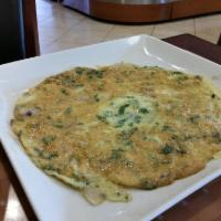 Veggie Omelet · Baby spinach, mushrooms, and kashkaval cheese. Served with Turkish bread.