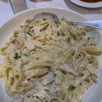 Fettuccine Alfredo · Fettuccine with a creamy alfredo sauce. Gluten-free option for an additional charge. 