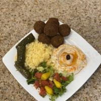 Falafel Plate · Mix of golden Garbanzo beans with garlic, beans and Garbanzo with garlic, onions, herbs and ...