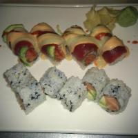 Westchester Roll · Crunchy spicy tuna inside topped with tuna and avocado with chef's special sauce.