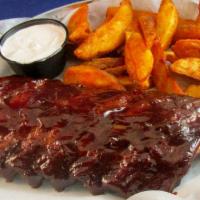 Ribs · Served with wedge fries and toasted garlic bread.