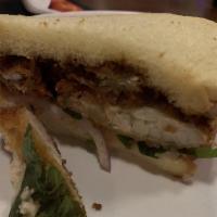 Soft Shell Crab Sando · Panko crusted soft shell crab, siso, onoin, spicy mayo, & eel sauce 