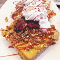 French Toast · 3 extra thick slices of batter dipped egg bread, griddled to a golden brown, sprinkled with ...