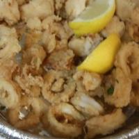 Fried Calamari · Rhode Island Atlantic, flash fried, marinara sauce and lemon.