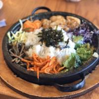 Rice Mixed with Assorted Mixtures in Hot Stone Pot · 