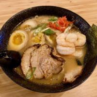 Tonkotsu Ramen · Pork broth, egg, chashu pork, bamboo, nori, and green onions.